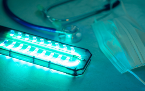 UV lamp and mask on table