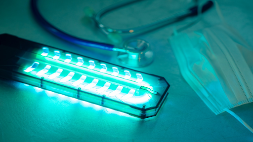 UV lamp and mask on table